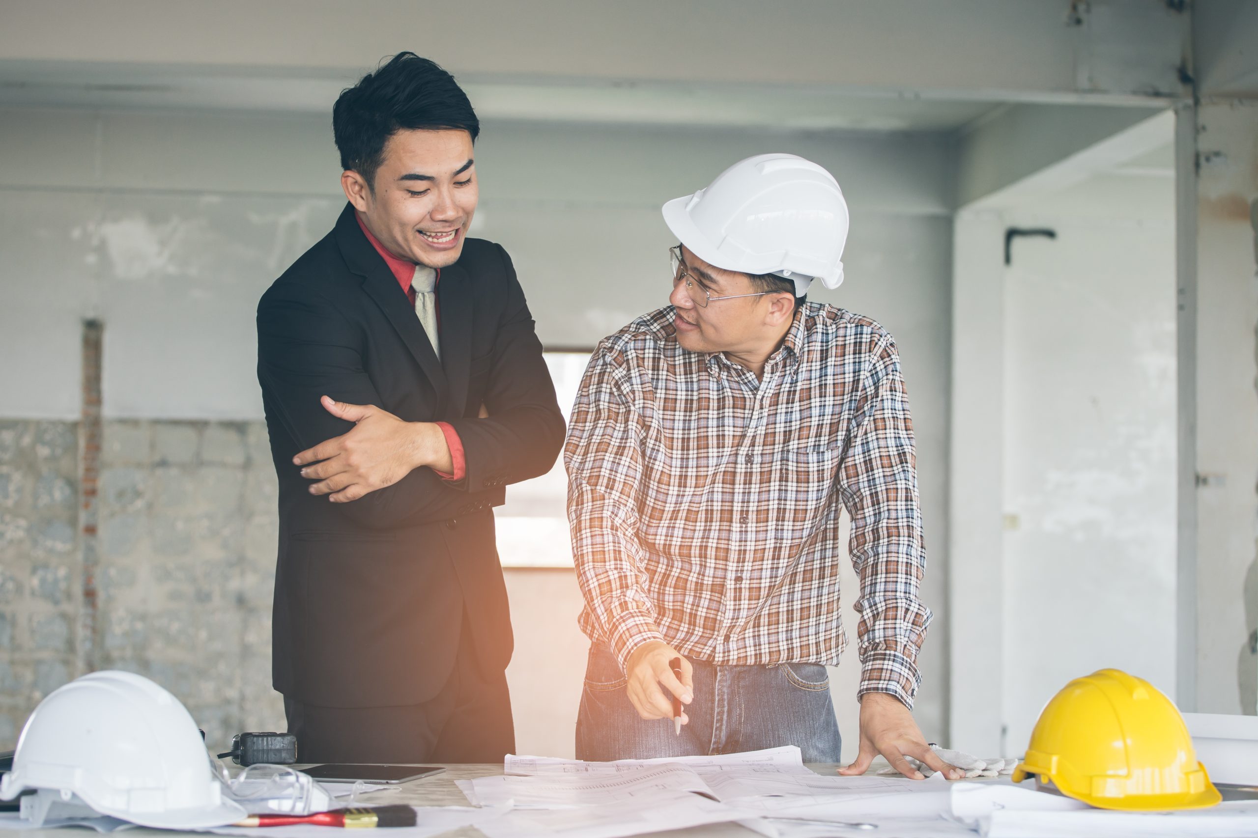 builder explaining delays to client